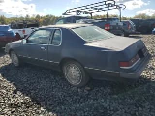 ✅ 1985 Ford Thunderbird Fila • VIN: 1FABP46F0FH113180 • Lot: 85123555. Listed on Copart with Not provided. Free auction sales archive from the USA and detailed vehicle history report at DreamBid. Image 2.