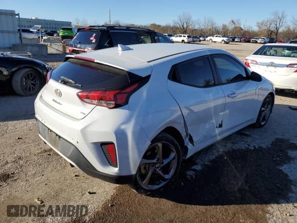 2020 Hyundai Veloster 2.0 z VIN KMHTG6AF4LU021831, wystawiony jako Copart lot #80334674 z przebiegiem 51 115 mil mil oraz Szkoda całkowita • Salvage title. Historia ofert i sprzedaży dostępna na DreamBid. Obrazek 3.