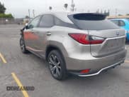 ✅ 2021 Lexus RX 450h • VIN: 2T2HGMDA3MC060208 • Лот: 42163455. Опубликован ранее на IAAI с пробегом 34 167 миль. Бесплатный доступ к архиву аукционных продаж из США и подробный отчёт об истории автомобиля на DreamBid. Изображение 3.