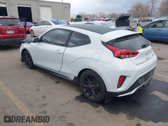 2019 Hyundai Veloster Turbo z VIN KMHTH6AB3KU020193, wystawiony jako IAAI lot #41526722 z przebiegiem 54 697 mil mil oraz . Historia ofert i sprzedaży dostępna na DreamBid. Obrazek 3.