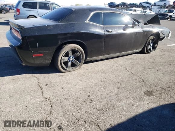 ✅ 2012 Dodge Challenger SXT • VIN: 2C3CDYAG6CH185543 • Lot: 80472334. Wystawiony na Copart z przebiegiem 151 035 mil. Bezpłatny archiwum sprzedaży aukcyjnych z USA i szczegółowy raport historii pojazdu na DreamBid. Zdjęcie 3.