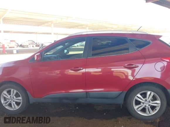 2010 Hyundai Tucson Limited with VIN KM8JU3ACXAU110479, listed as a IAAI auction lot 43541084 with 187,643 mi miles and . Bid and sale history available at DreamBid. Image 14.