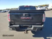 ✅ 2021 GMC Canyon 4WD AT4 • VIN: 1GTG6FEN0M1251119 • Lot: 88687565. Listed on Copart with 114,839 mi. Free auction sales archive from the USA and detailed vehicle history report at DreamBid. Image 6.