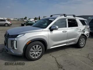 ✅ 2025 Hyundai Palisade SEL • VIN: KM8R24GE8SU901828 • Лот: 84585005. Опубликован ранее на Copart с пробегом 7 165 миль. Бесплатный доступ к архиву аукционных продаж из США и подробный отчёт об истории автомобиля на DreamBid. Изображение 1.