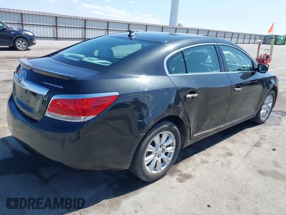 ✅ 2013 Buick LaCrosse Leather • VIN: 1G4GC5ER4DF256294 • Lot: 41924078. Listed on IAAI with 158,402 mi. Free auction sales archive from the USA and detailed vehicle history report at DreamBid. Image 4.