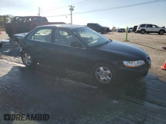 2000 Honda Accord EX с VIN 1HGCG1651YA094494, выставлен на аукционе Copart как лот 86269555 с пробегом 100 293 миль миль и Списание • Salvage title. История ставок и продаж доступна на DreamBid. Изображение 4.