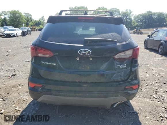 2018 Hyundai Santa Fe 2.4L с VIN 5NMZUDLB3JH106220, выставлен на аукционе Copart как лот 91757075 с пробегом Не указан миль и На запчасти • Non repairable. История ставок и продаж доступна на DreamBid. Изображение 6.