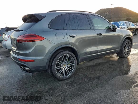 ✅ 2016 Porsche Cayenne S E-Hybrid • VIN: WP1AE2A23GLA17786 • Lot: 95221045. Listed on Copart with 134,959 mi. Free auction sales archive from the USA and detailed vehicle history report at DreamBid. Image 3.