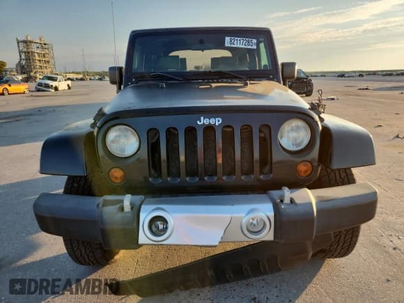 ✅ 2008 Jeep Wrangler Sahara • VIN: 1J8FA54158L589606 • Лот: 82117285. Опубликован ранее на Copart с пробегом 143 741 миль. Бесплатный доступ к архиву аукционных продаж из США и подробный отчёт об истории автомобиля на DreamBid. Изображение 5.