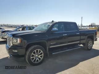 ✅ 2018 GMC Sierra 1500 Denali • VIN: 3GTU2PECXJG117346 • Лот: 47959885. Опубликован ранее на Copart с пробегом 93 416 миль. Бесплатный доступ к архиву аукционных продаж из США и подробный отчёт об истории автомобиля на DreamBid. Изображение 1.