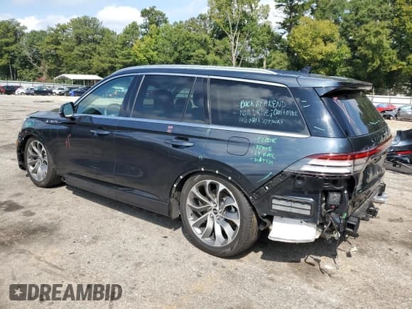✅ 2022 Lincoln Aviator Grand Touring • VIN: 5LMYJ8XY3NNL01410 • Lot: 67887033. Listed on Copart with 22,371 mi. Free auction sales archive from the USA and detailed vehicle history report at DreamBid. Image 2.