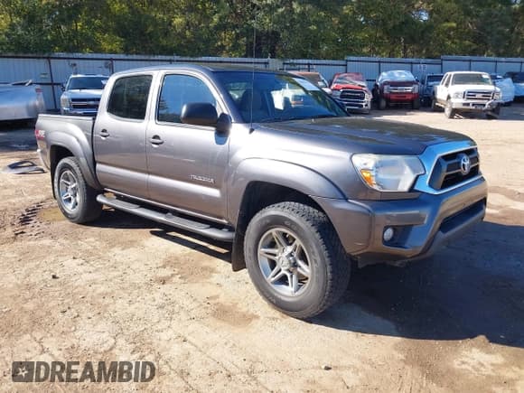 ✅ 2014 Toyota Tacoma PreRunner • VIN: 5TFJU4GN5EX058881 • Lot: 43603920. Listed on IAAI with 170,876 mi. Free auction sales archive from the USA and detailed vehicle history report at DreamBid. Image 1.