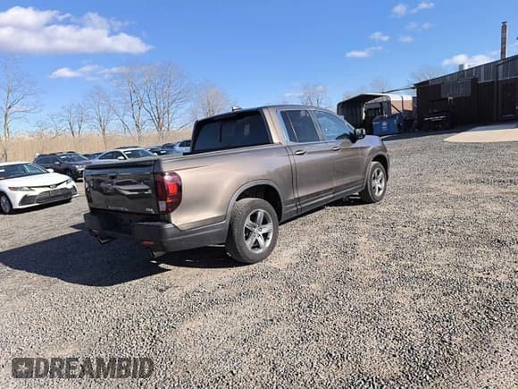✅ 2023 Honda Ridgeline RTL • VIN: 5FPYK3F58PB004446 • Lot: 91694765. Wystawiony na Copart z przebiegiem 57 866 mil. Bezpłatny archiwum sprzedaży aukcyjnych z USA i szczegółowy raport historii pojazdu na DreamBid. Zdjęcie 4.