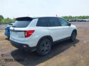 ✅ 2021 Honda Passport EX-L • VIN: 5FNYF8H59MB007097 • Lot: 42409181. Listed on IAAI with 74,410 mi. Free auction sales archive from the USA and detailed vehicle history report at DreamBid. Image 4.