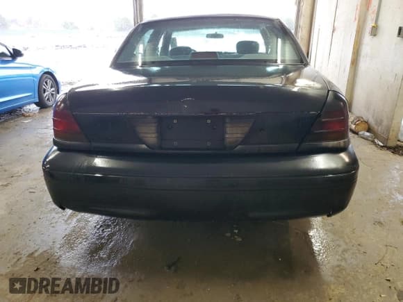 ✅ 1999 Ford Crown Victoria Police • VIN: 2FAFP71W7XX105850 • Lot: 43760905. Listed on Copart with 308,252 mi. Free auction sales archive from the USA and detailed vehicle history report at DreamBid. Image 6.