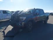 ✅ 2021 GMC Sierra 1500 AT4 • VIN: 3GTP9EEL4MG407812 • Лот: 43501960. Опубликован ранее на IAAI с пробегом 86 015 миль. Бесплатный доступ к архиву аукционных продаж из США и подробный отчёт об истории автомобиля на DreamBid. Изображение 2.