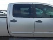 ✅ 2011 Nissan Titan • VIN: 1N6BA0FCXBN309162 • Lot: 42972161. Listed on IAAI with 336,992 mi. Free auction sales archive from the USA and detailed vehicle history report at DreamBid. Image 13.