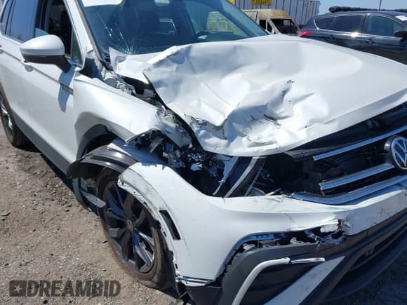 ✅ 2023 Volkswagen Tiguan SE • VIN: 3VVMB7AX4PM128427 • Lot: 42054477. Listed on IAAI with 29,731 mi. Free auction sales archive from the USA and detailed vehicle history report at DreamBid. Image 6.