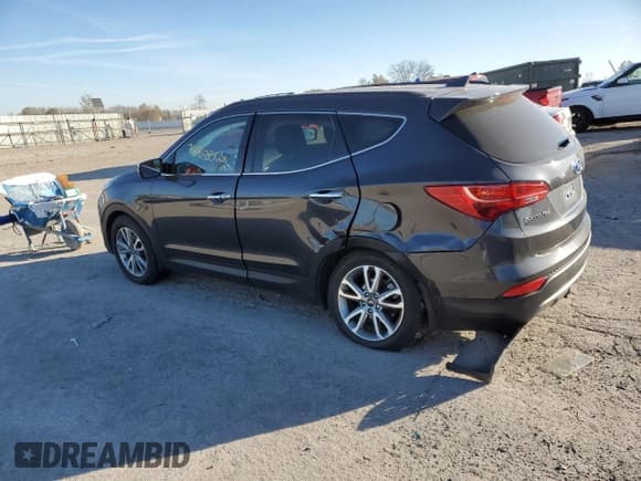 ✅ 2015 Hyundai Santa Fe Limited • VIN: 5XYZUDLA5FG295073 • Lot: 74833803. Listed on Copart with 104,071 mi. Free auction sales archive from the USA and detailed vehicle history report at DreamBid. Image 2.