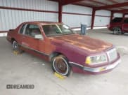 ✅ 1984 Ford Thunderbird • VIN: 1FABP4630EA111572 • Lot: 41569309. Listed on IAAI with 7,919 mi. Free auction sales archive from the USA and detailed vehicle history report at DreamBid. Image 1.