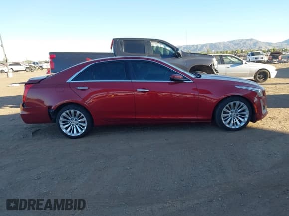 ✅ 2014 Cadillac CTS Luxury AWD • VIN: 1G6AX5SX7E0135512 • Lot: 43642924. Wystawiony na IAAI z przebiegiem 135 743 mil. Bezpłatny archiwum sprzedaży aukcyjnych z USA i szczegółowy raport historii pojazdu na DreamBid. Zdjęcie 13.