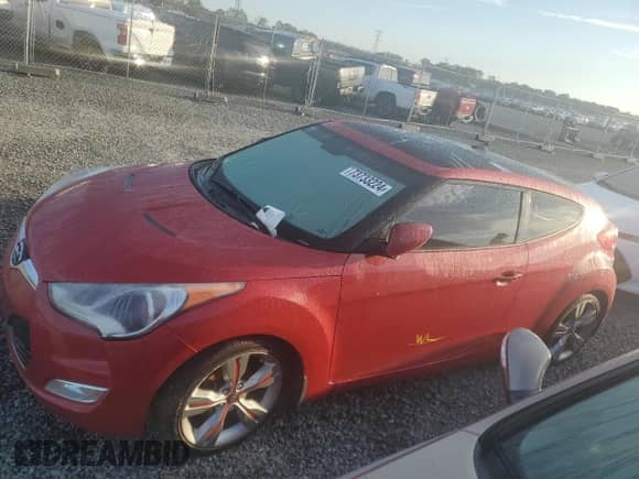 2013 Hyundai Veloster w/Black Int z VIN KMHTC6AD1DU119193, wystawiony jako Copart lot #73733224 z przebiegiem Nie podano mil oraz Szkoda całkowita • Salvage title. Historia ofert i sprzedaży dostępna na DreamBid. Obrazek 1.