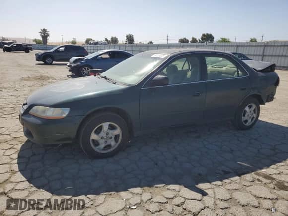 2000 Honda Accord EX with VIN JHMCG6675YC037201, listed as a Copart auction lot 59120345 with 202,552 mi miles and Salvage title. Bid and sale history available at DreamBid. Image 1.