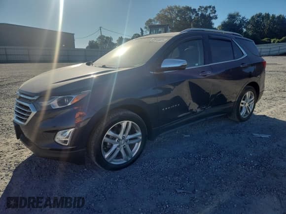 ✅ 2018 Chevrolet Equinox Premier • VIN: 3GNAXMEV5JL105706 • Lot: 82513825. Listed on Copart with 77,883 mi. Free auction sales archive from the USA and detailed vehicle history report at DreamBid. Image 1.