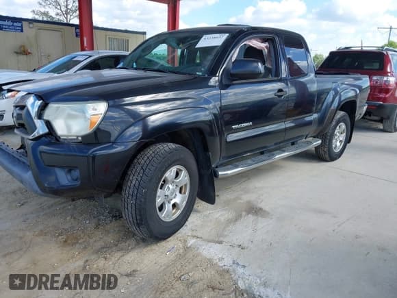 ✅ 2015 Toyota Tacoma • VIN: 5TFUX4EN5FX036792 • Lot: 43338032. Listed on IAAI with 167,320 mi. Free auction sales archive from the USA and detailed vehicle history report at DreamBid. Image 2.