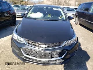 ✅ 2018 Chevrolet Cruze LS • VIN: 1G1BC5SM0J7180644 • Lot: 38956783. Listed on Copart with 49,748 mi. Free auction sales archive from the USA and detailed vehicle history report at DreamBid. Image 5.