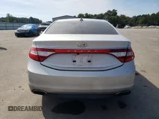 ✅ 2015 Hyundai Azera • VIN: KMHFG4JG7FA454138 • Лот: 81660335. Опубликован ранее на Copart с пробегом 127 762 миль. Бесплатный доступ к архиву аукционных продаж из США и подробный отчёт об истории автомобиля на DreamBid. Изображение 6.