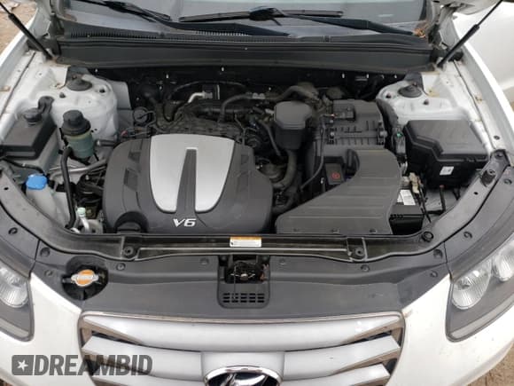 ✅ 2012 Hyundai Santa Fe Limited • VIN: 5XYZK4AG9CG138803 • Lot: 72385414. Listed on Copart with 140,718 mi. Free auction sales archive from the USA and detailed vehicle history report at DreamBid. Image 12.