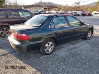 ✅ 2000 Honda Accord EX • VIN: 1HGCG1657YA073410 • Lot: 43819519. Listed on IAAI with 189,219 mi. Free auction sales archive from the USA and detailed vehicle history report at DreamBid. Image 4.