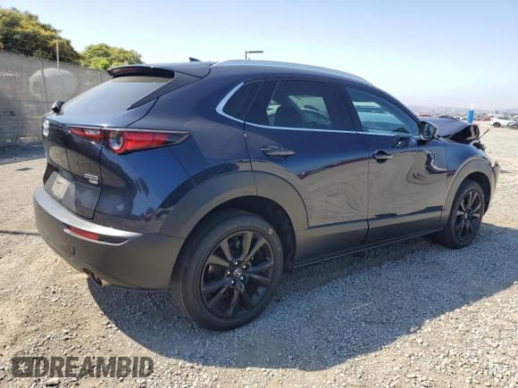 ✅ 2023 Mazda CX-30 Premium • VIN: 3MVDMBDY2PM551196 • Lot: 63128945. Listed on Copart with 28,893 mi. Free auction sales archive from the USA and detailed vehicle history report at DreamBid. Image 3.