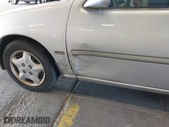 ✅ 2001 Nissan Altima GXE • VIN: 1N4DL01D71C235723 • Lot: 42711721. Listed on IAAI with 84,111 mi. Free auction sales archive from the USA and detailed vehicle history report at DreamBid. Image 6.