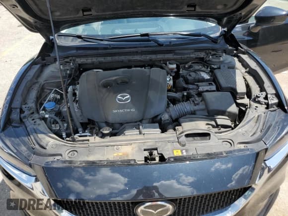 ✅ 2021 Mazda 6 Touring • VIN: JM1GL1VM3M1612829 • Лот: 63479445. Опубликован ранее на Copart с пробегом 66 601 миль. Бесплатный доступ к архиву аукционных продаж из США и подробный отчёт об истории автомобиля на DreamBid. Изображение 11.