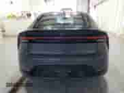 2025 Toyota Prius LE with VIN JTDACAAU3S3056891, listed as a Copart auction lot 86232595 with 9,042 mi miles and Non repairable. Bid and sale history available at DreamBid. Image 6.