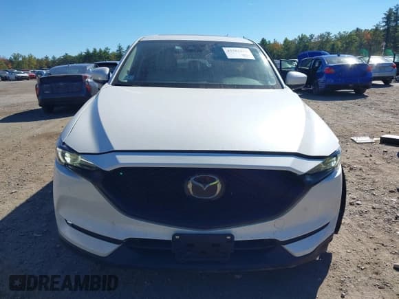 ✅ 2021 Mazda CX-5 Grand Touring • VIN: JM3KFBDM2M0470446 • Лот: 43382643. Опубликован ранее на IAAI с пробегом 67 536 миль. Бесплатный доступ к архиву аукционных продаж из США и подробный отчёт об истории автомобиля на DreamBid. Изображение 12.