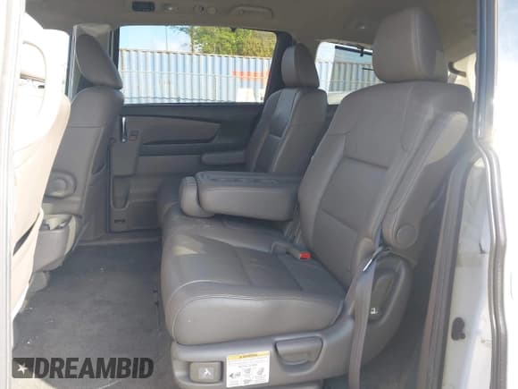 ✅ 2014 Honda Odyssey Touring • VIN: 5FNRL5H93EB043383 • Lot: 43571864. Listed on IAAI with 186,950 mi. Free auction sales archive from the USA and detailed vehicle history report at DreamBid. Image 8.