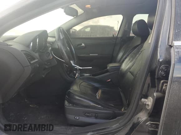 ✅ 2012 Chevrolet Malibu LTZ • VIN: 1G1ZG5E72CF293321 • Lot: 79355424. Listed on Copart with 185,569 mi. Free auction sales archive from the USA and detailed vehicle history report at DreamBid. Image 7.