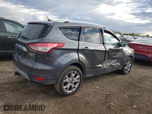 ✅ 2015 Ford Escape Titanium • VIN: 1FMCU9J98FUB16983 • Lot: 89482625. Listed on Copart with 142,998 mi. Free auction sales archive from the USA and detailed vehicle history report at DreamBid. Image 3.