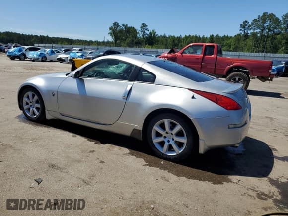 ✅ 2004 Nissan 350Z Touring • VIN: JN1AZ34D24T163720 • Lot: 57777675. Listed on Copart with 148,628 mi. Free auction sales archive from the USA and detailed vehicle history report at DreamBid. Image 2.