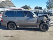 ✅ 1999 Lexus LX 470 • VIN: JT6HT00W5X0075986 • Lot: 41228035. Listed on IAAI with 163,548 mi. Free auction sales archive from the USA and detailed vehicle history report at DreamBid. Image 13.