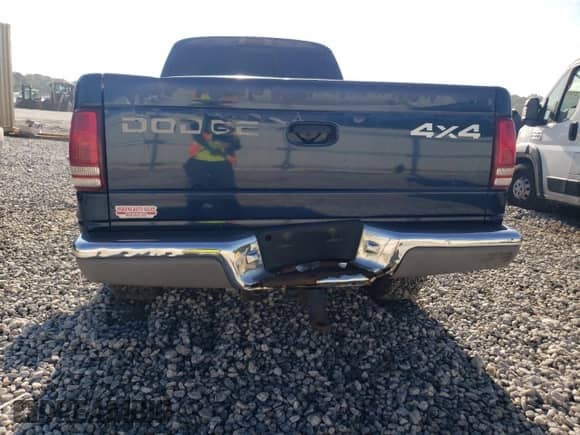 2000 Dodge Dakota Sport z VIN 1B7GG22N5YS733630, wystawiony jako Copart lot #67958294 z przebiegiem Nie podano mil oraz Nie do naprawy • Non repairable. Historia ofert i sprzedaży dostępna na DreamBid. Obrazek 6.