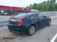 ✅ 2013 Cadillac CTS Performance • VIN: 1G6DJ1E34D0109142 • Lot: 42689298. Listed on IAAI with 106,548 mi. Free auction sales archive from the USA and detailed vehicle history report at DreamBid. Image 4.