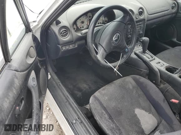 ✅ 2002 Mazda MX-5 Miata Cloth • VIN: JM1NB353X20222049 • Лот: 75404914. Опубликован ранее на Copart с пробегом Не указан. Бесплатный доступ к архиву аукционных продаж из США и подробный отчёт об истории автомобиля на DreamBid. Изображение 8.