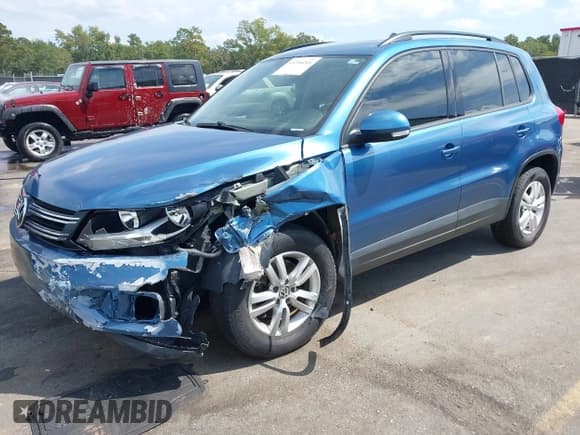✅ 2017 Volkswagen Tiguan S • VIN: WVGBV7AXXHW512710 • Lot: 43216266. Wystawiony na IAAI z przebiegiem 88 771 mil. Bezpłatny archiwum sprzedaży aukcyjnych z USA i szczegółowy raport historii pojazdu na DreamBid. Zdjęcie 2.