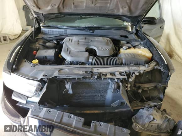 2012 Dodge Charger SXT Plus z VIN 2C3CDXJG8CH178958, wystawiony jako Copart lot #70413935 z przebiegiem 192 707 mil mil oraz Szkoda całkowita • Salvage title. Historia ofert i sprzedaży dostępna na DreamBid. Obrazek 11.