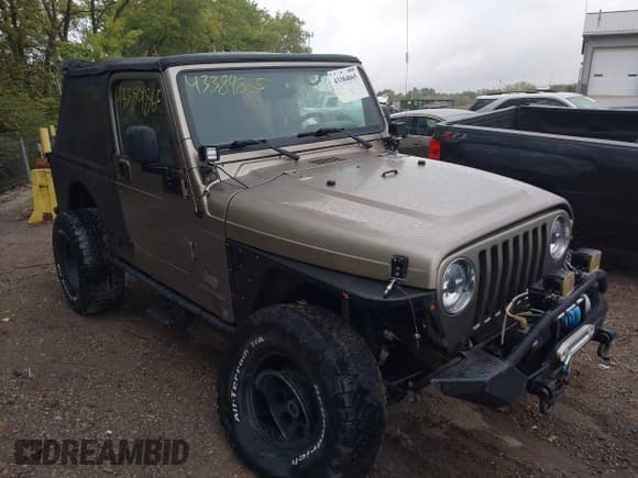 ✅ 2005 Jeep Wrangler Unlimited • VIN: 1J4FA44S15P301007 • Lot: 43384865. Listed on IAAI with 133,877 mi. Free auction sales archive from the USA and detailed vehicle history report at DreamBid. Image 1.