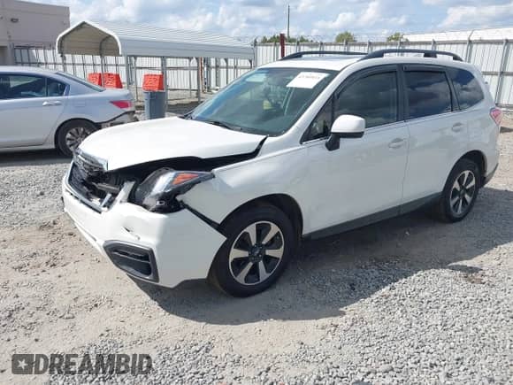 2017 Subaru Forester Limited with VIN JF2SJAJC1HH414553, listed as a IAAI auction lot 43289933 with 120,913 mi miles and . Bid and sale history available at DreamBid. Image 17.